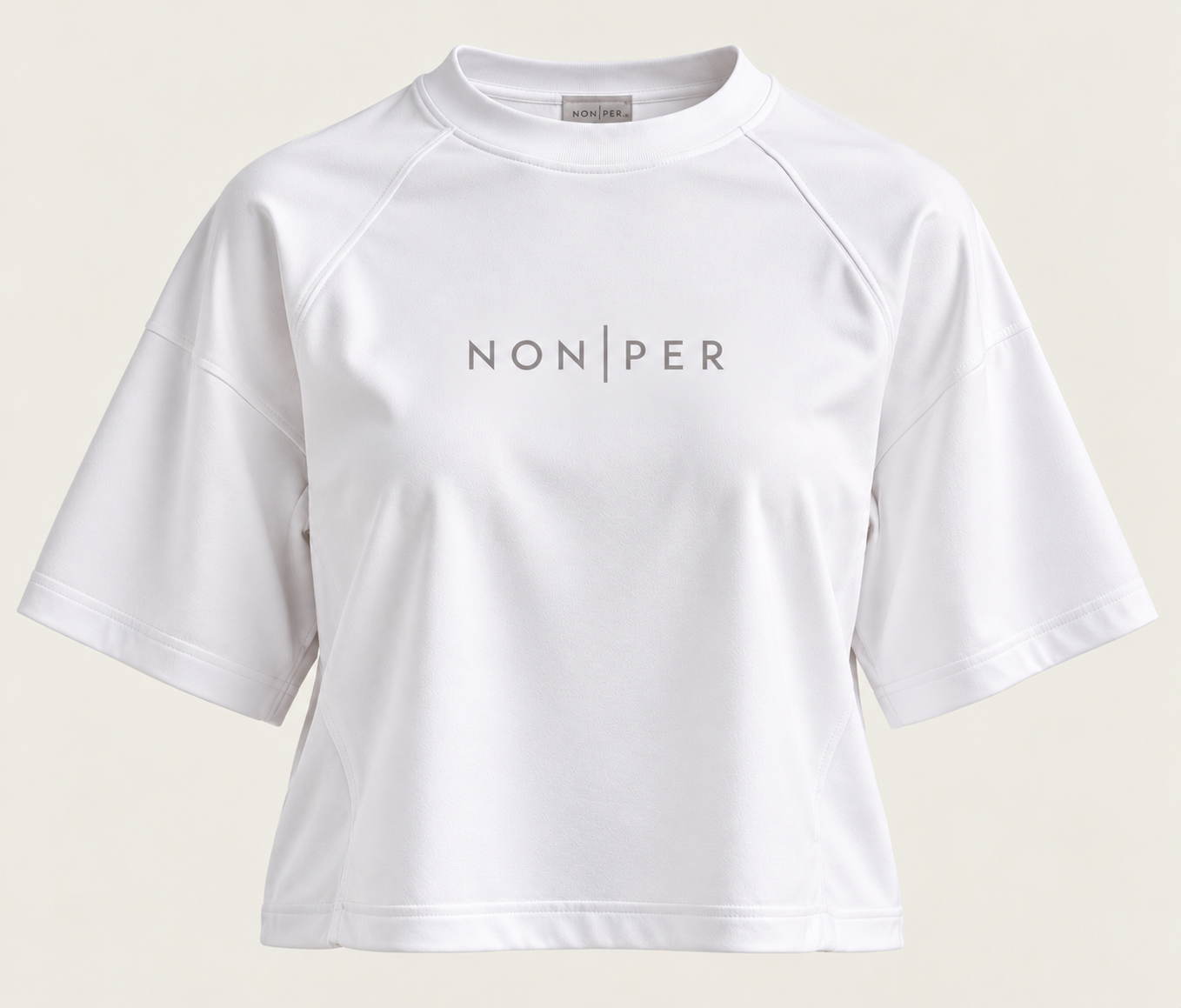 White relaxed raglan Centre Tee with the NON | PER wordmark across the chest