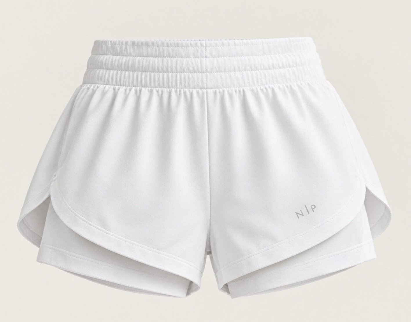 White Sideline Short with the N | P monogram on the left leg
